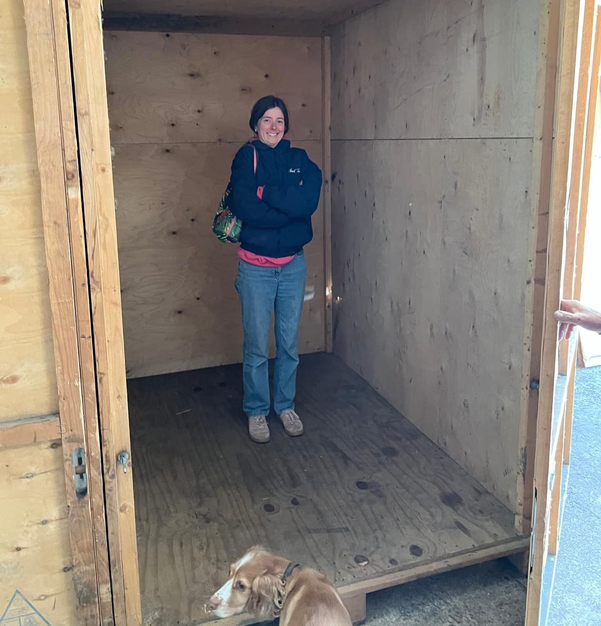 Customer standing inside an empty storage container at Sandlea Farm